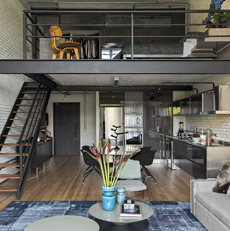 Industrial style loft interior with mezzanine