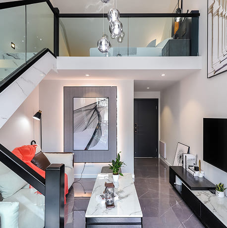 Modern white interior with glass staircase